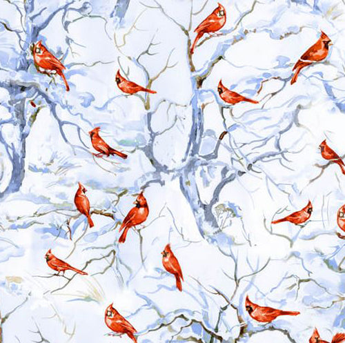 This cotton fabric features red cardinals among snowy winter trees