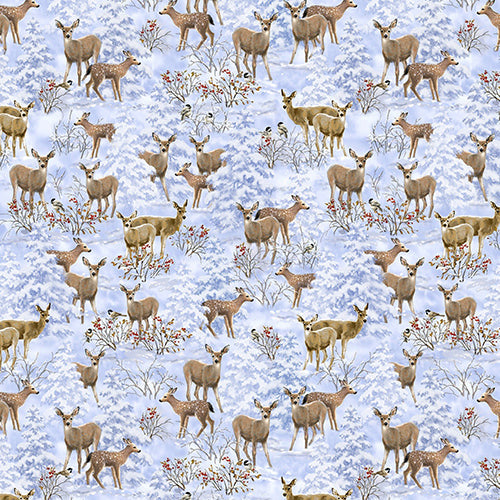 This cotton fabric features small deer among bushes with red berries and snow-covered evergreen trees in shades of blue and gray.