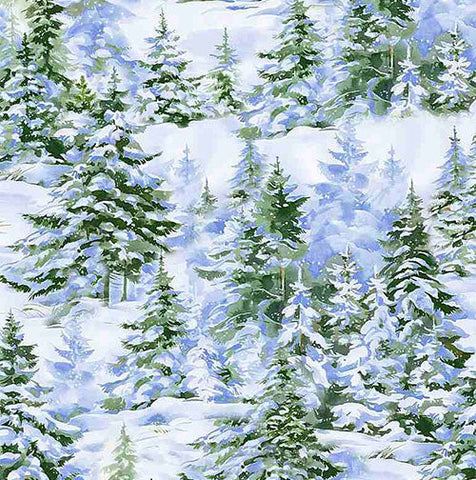 This cotton fabric features snow-covered evergreen winter trees in shades of green and blue/gray.