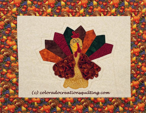 Appliqued turkey on cream colored placemats