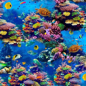 This cotton fabric features tropical fish, sea turtles, and coral on a blue background. Available at Colorado Creations Quilting