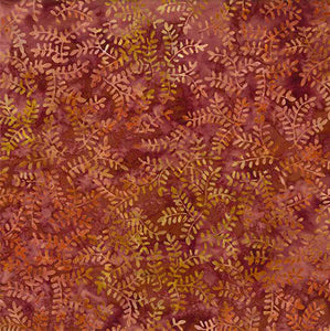 This batik tonal fabric features ferns on a rust background Cotton Fabric