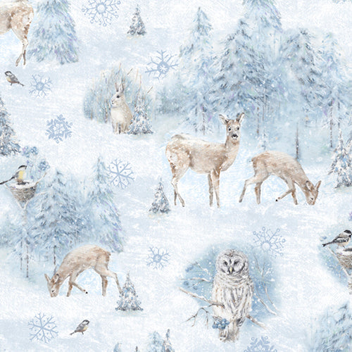 This cotton fabric features snow-covered trees, deer, rabbits and snowy owls. Available at Colorado Creations Quilting