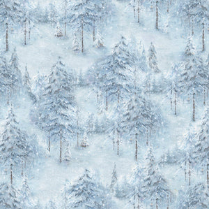 Snow-covered evergreen trees are featured in this cotton fabric with a blue overall tint.  Available at Colorado Creations Quilting